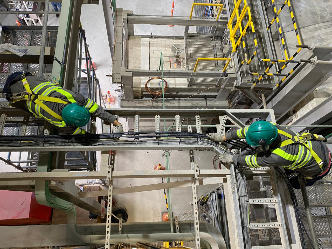 SIMECO technicians working on an industrial electrical installation